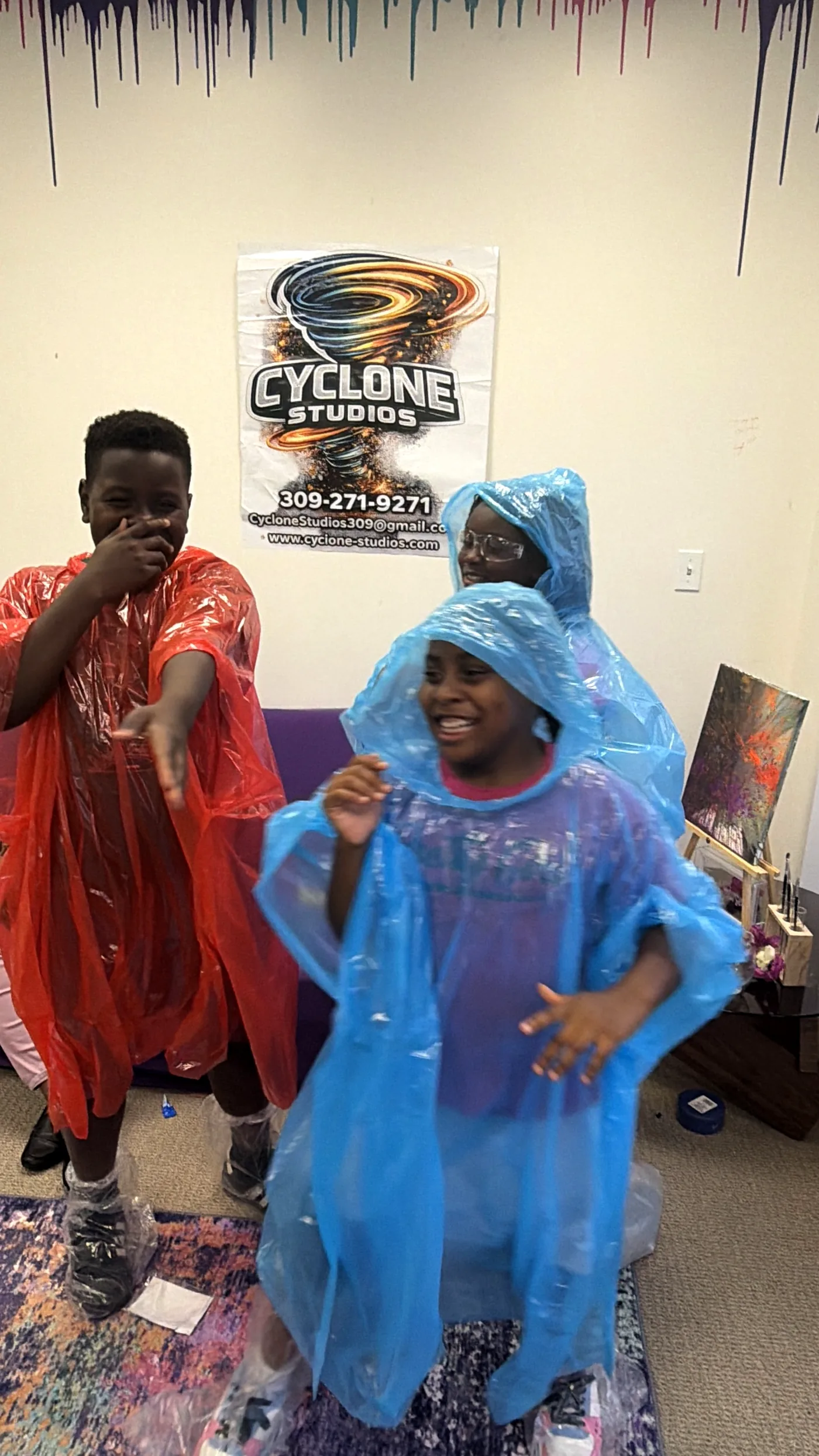 Children laughing together at Cyclone Studios
